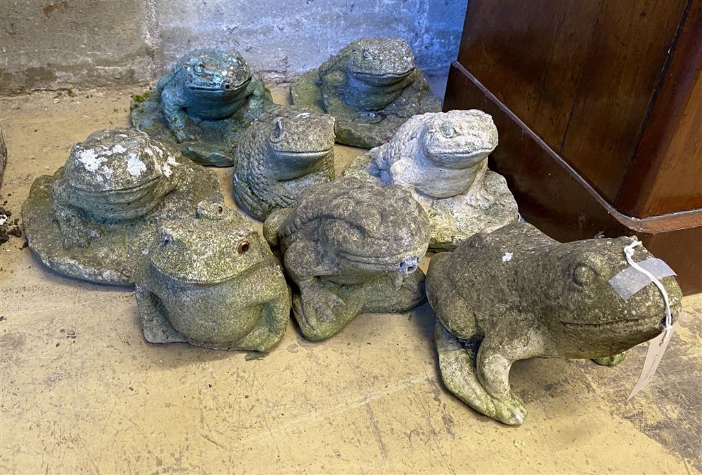 Eight reconstituted stone garden ornaments of frogs and toads, three as fountain heads, largest 18cm high